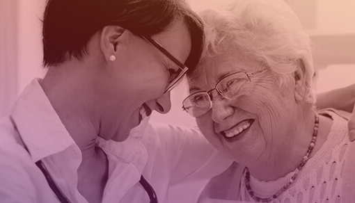 senior woman smiling with doctor